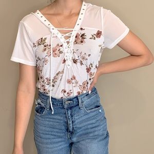 Floral tee with design all throughout chest area